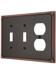Imperial Bead Double Toggle/Duplex Combination Switch Plate in Aged Bronze.
